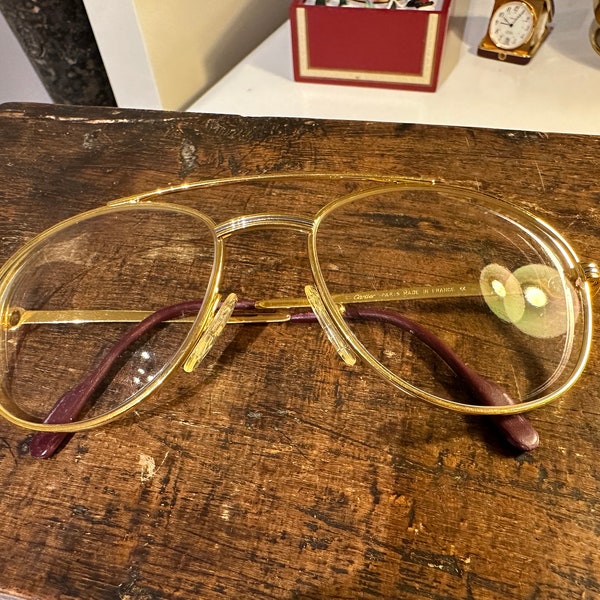 Cartier Glasses farme gold and metal aviator superb