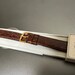 Bracelet montre cuir imitation téju gold