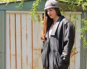 1980's Leather Jacket with Huge Large Shoulder Pads and Dropped Waist/ Size  Med to Large