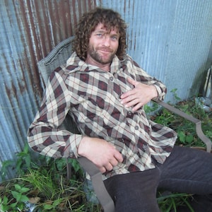 Vrijetijdspak jaren 1970, argylepatroon met zakken, handgemaakt polyester, eind jaren 60 begin jaren 70. Mouw manchet, originele knopen, uniseks