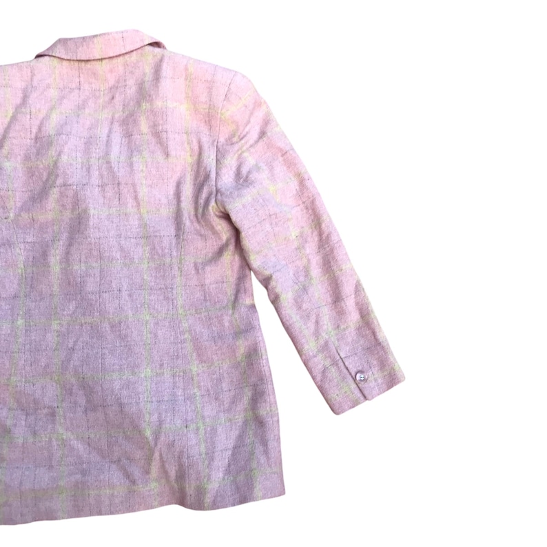May include: A pink blazer with a light green plaid pattern. The blazer has a single button closure and long sleeves.