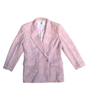 May include: A pink and yellow plaid blazer with a double breasted closure and a single pocket on the left side.
