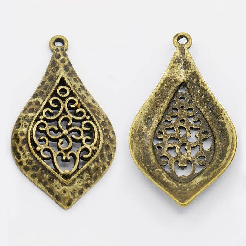 2 ethnic bronze drop pendants image 1