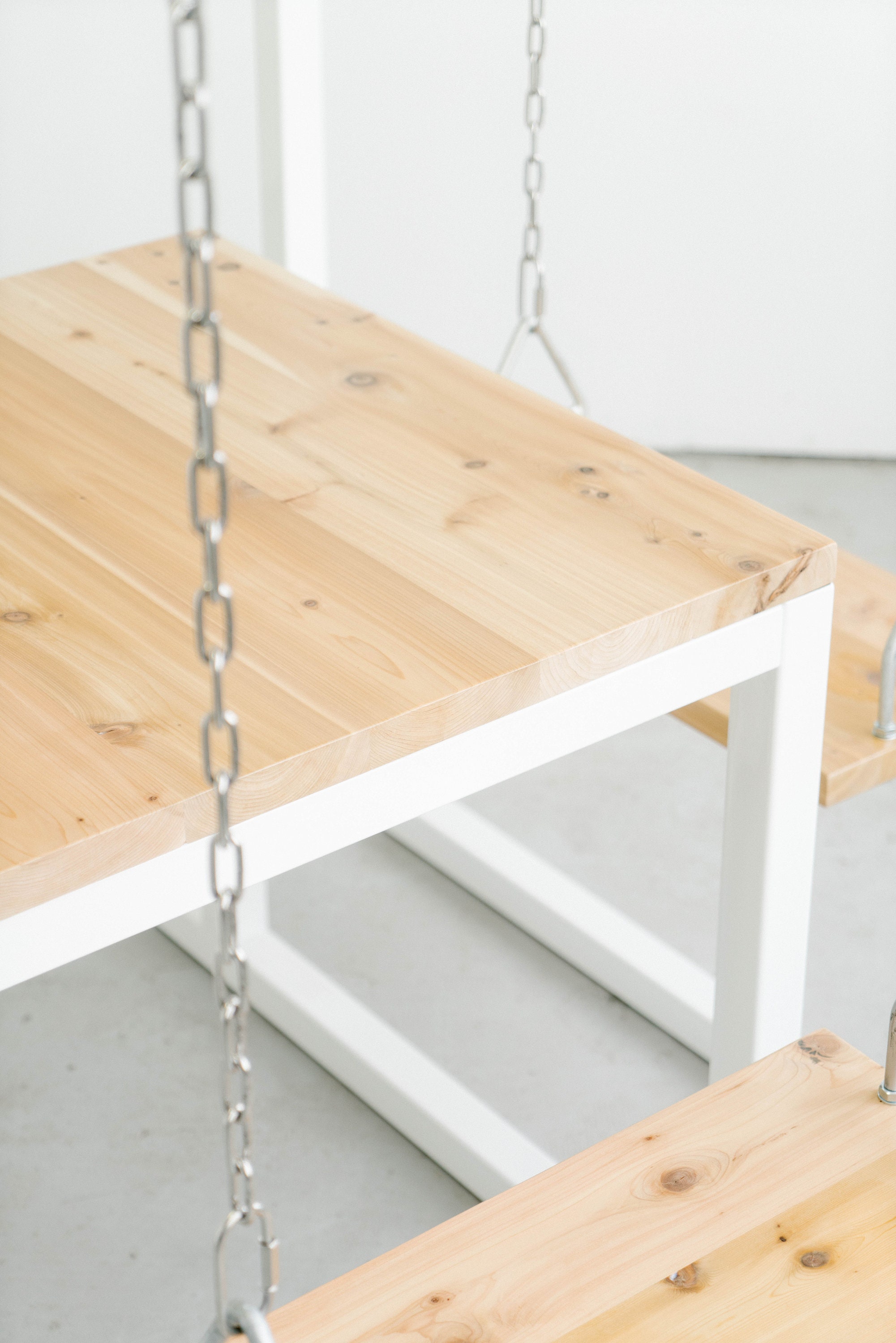 Swing outlet dining table