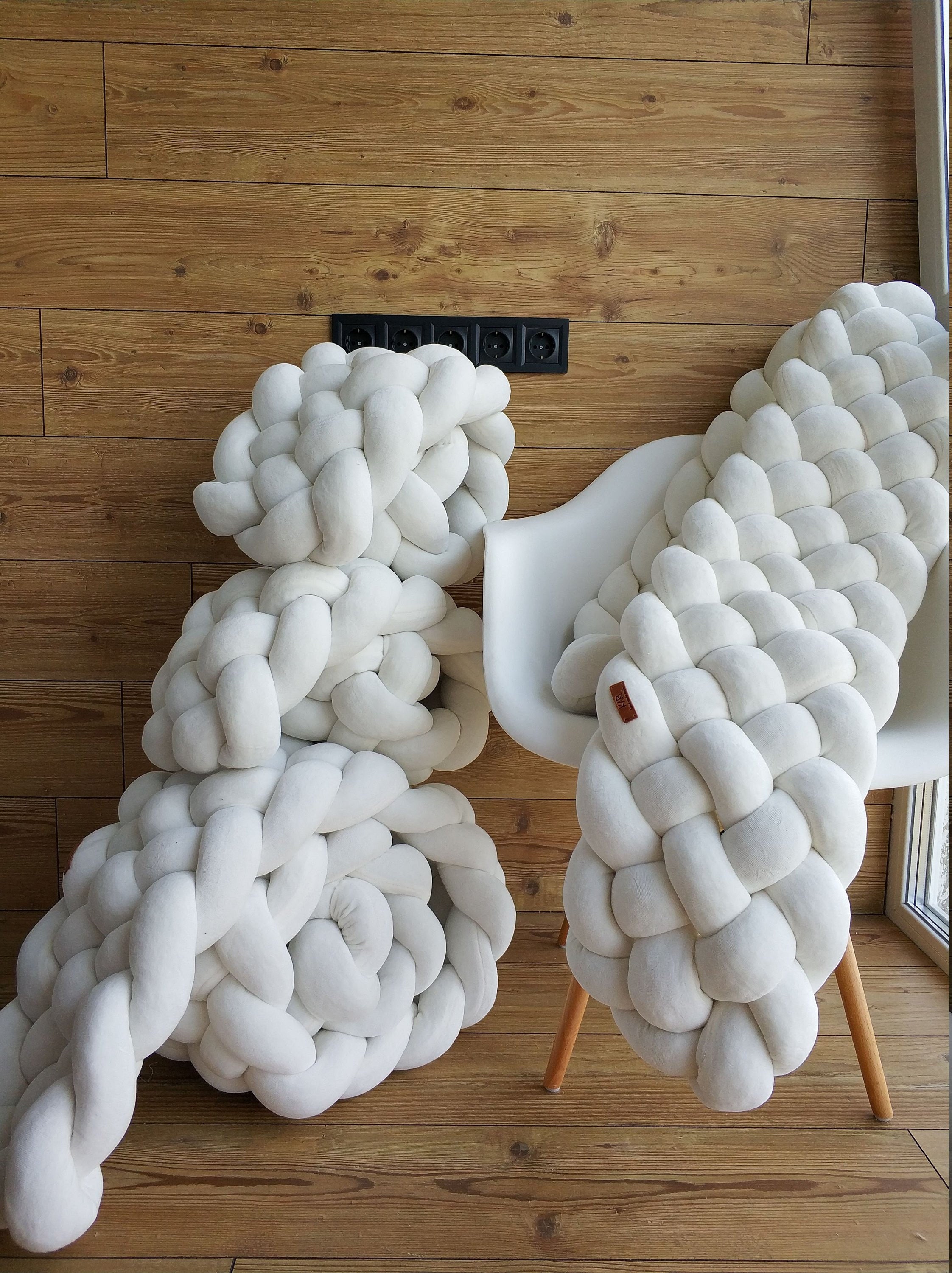 white braided crib bumper