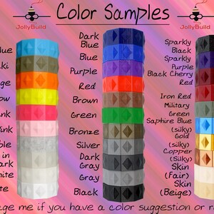 May include: Color samples for 3D printing filament.  The colors are arranged in columns, with names like Light Blue, Khaki, Orange, Yellow, Pink, Baby Pink, Marble, Glow in the Dark, Milky White, White, Dark Blue, Blue, Purple, Red, Brown, Green, Bronze, Silver, Dark Gray, Gray, Black, Sparkly Black, Sparkly Purple, Black Cherry Red, Iron Red, Military Green, Sapphire Blue, (silky) Gold, (silky) Copper, (silky) Skin (Fair) Skin (Beige).