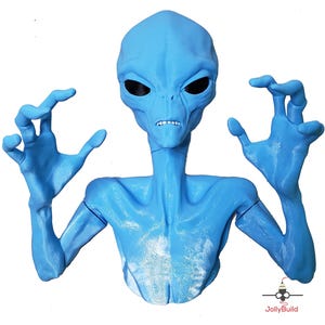 May include: A blue alien bust with large eyes and a menacing expression. The alien has its arms outstretched with its hands in a clawing position.