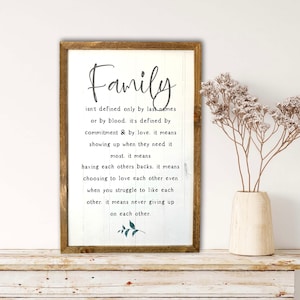 Family isn’t defined by last name or by blood rustic farmhouse sign housewarming gift for family farmhouse inspirational wall art