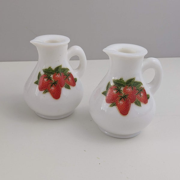 Two Vintage Avon Strawberry Milk Glass Pitchers