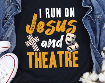 May include: Black t-shirt with the text "I run on Jesus and Theatre" in yellow with a cross and two theatre masks.