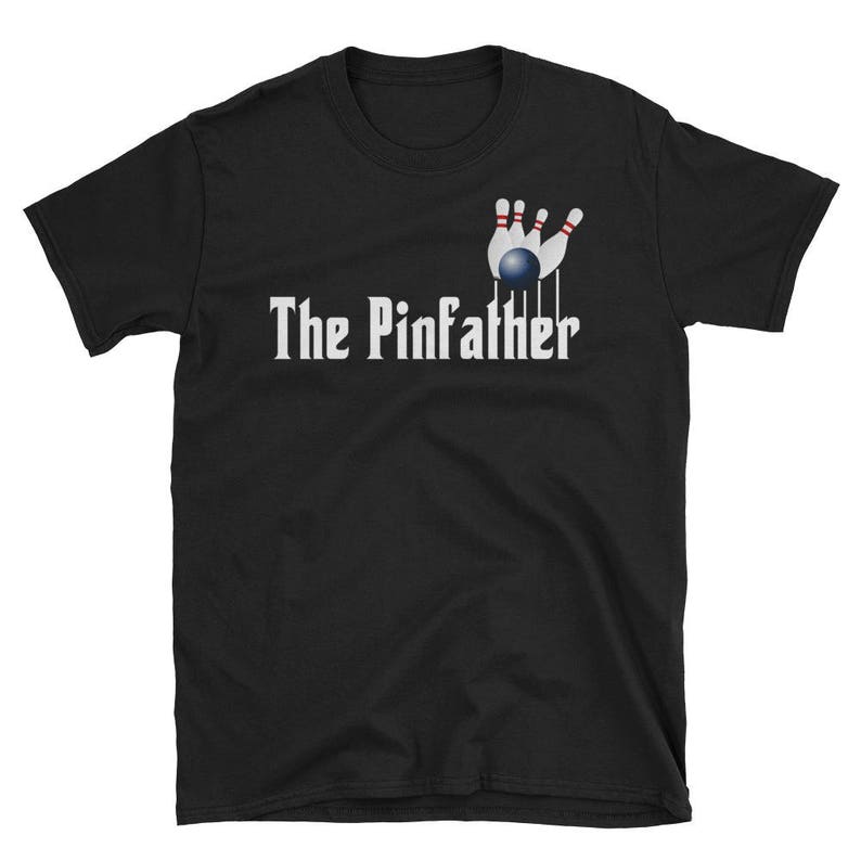 May include: Black t-shirt with a white graphic of a bowling ball and pins. The text "The Pinfather" is printed below the graphic.