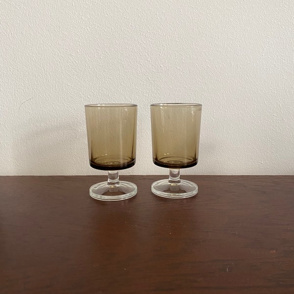 Set of two luminarc champagne glasses in smokey brown glass