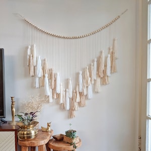 White, cream and beige yarn tassel wall hanging / Over the crib art / Boho wall decor / Gender neutral Nursery / Tassel garland