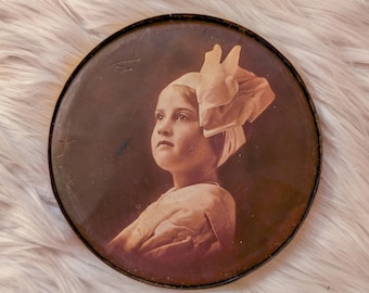 Antique Celluloid on Tin Portrait of a Girl with Bow