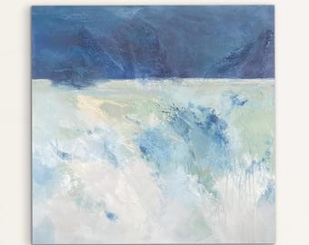 May include: A square abstract painting featuring a deep navy blue upper section that transitions into a lighter, textured foreground of pale blue, white, and soft green tones with visible brushstrokes and paint drips throughout the canvas.
