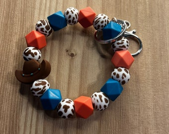 Portachiavi Da Polso MAMA – Simpatico Design Mucca In Silicone Con Perline E Nappa – Regalo Festa Della Mamma