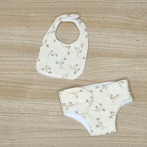 Diaper, bib and baby wipes in double gauze branch pattern available in several sizes