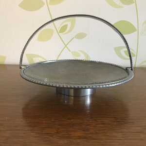 very rare circa 1940 speculum plate made in england copper tin fruit bowl with folding handle on pedestal