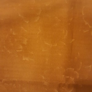 Lucien fabrics   Made in Japan    Bronze with floral background fat quarters