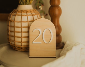 modern minimal arch wedding table numbers | wood and white acrylic table numbers for weddings or events | laser cut engraved wedding decor