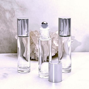 3 Roll on Bottles with Perfume Oil. Our Roll On Bottles can hold Perfume Oils, Essential Oils and Fragrance Oils.