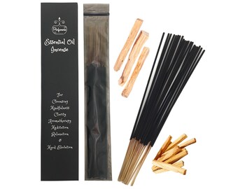 May include: A package of black incense sticks with a black and white label that reads "Essential Oil Incense" and lists uses for cleansing, mindfulness, clarity, aromatherapy, meditation, relaxation, and mood elevation. The package is next to a pile of wooden sticks.