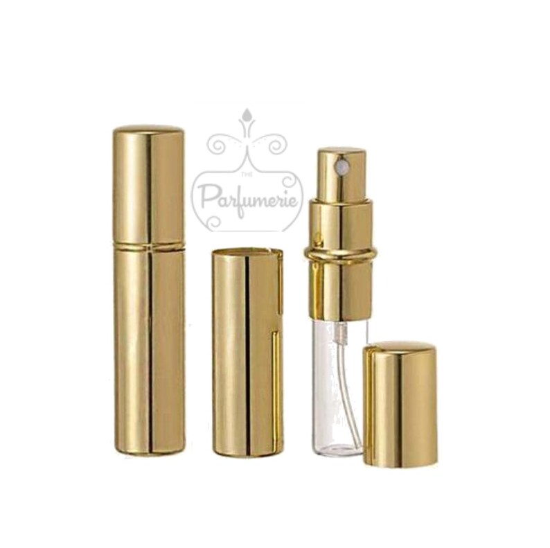 Gold Metallic Perfume Bottle with it's full body gold on and also showing the cap and body off to see there is a clear 12 ml Roll on Bottle inside the gold casing. This allows you to see how much perfume is left.