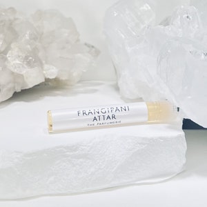 1 ml Sample Vial of Frangipani Attar Perfume Oil. Alcohol-Free, Phthalate-Free, Paraben-Free, Vegan, Cruelty-Free and Gluten-Free.