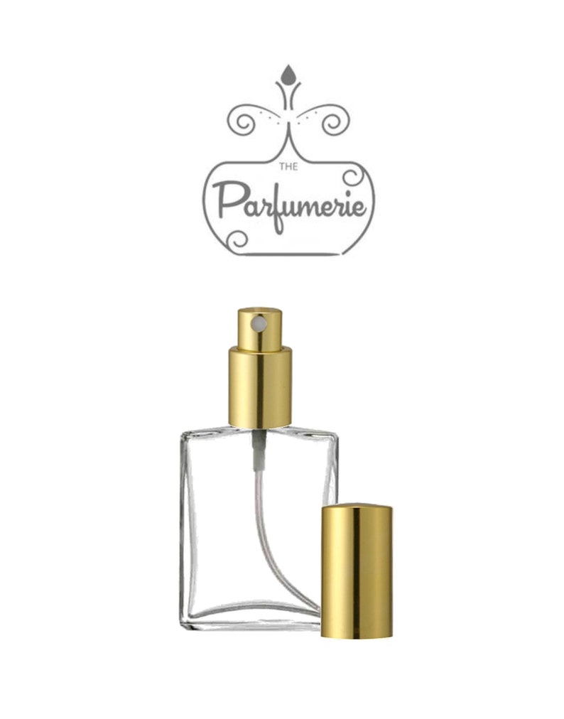 1 oz. or 2 oz. Clear Glass Perfume Spray Bottle with a Flat, rectangular shape and Gold Sprayer top.