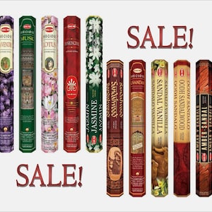 May include: A variety pack of HEM incense sticks in various scents, including Lavender, Musk, Lotus, Jasmine, Sandalwood, and Amber & Sandal. The packaging features images of flowers, animals, and intricate designs. The text "SALE!" is displayed twice in the image.