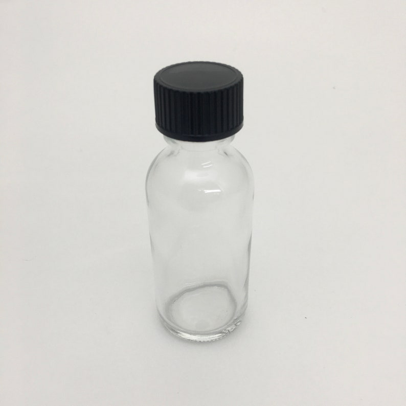 Clear Glass 1 oz. Boston Round Bottle. This is a great Travel Perfume Bottle.