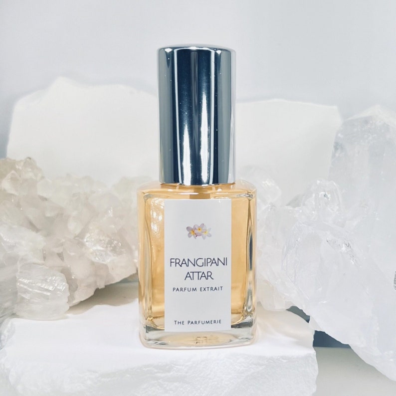 The Parfumerie offers Frangipani Attar 30 ml Parfum Extrait with Organic Cane Alcohol. A spray perfume bottle.