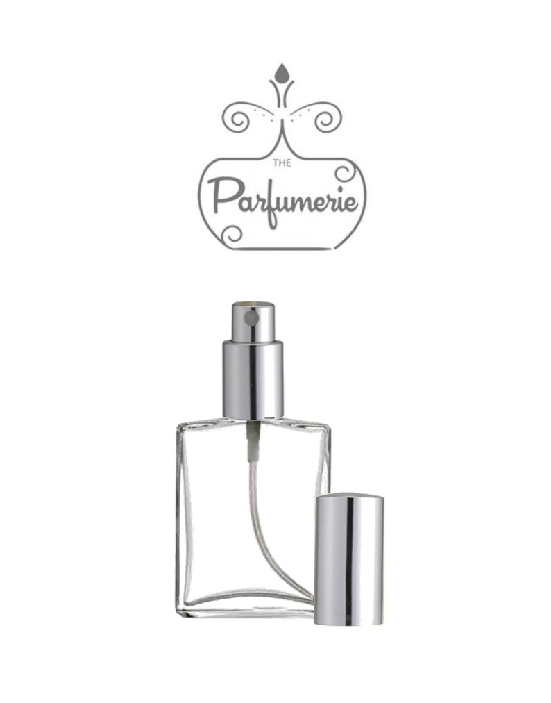 1 oz. or 2 oz. Clear Glass Essential Oil Perfume Bottle with a Flat, rectangular shape and Silver Sprayer top.