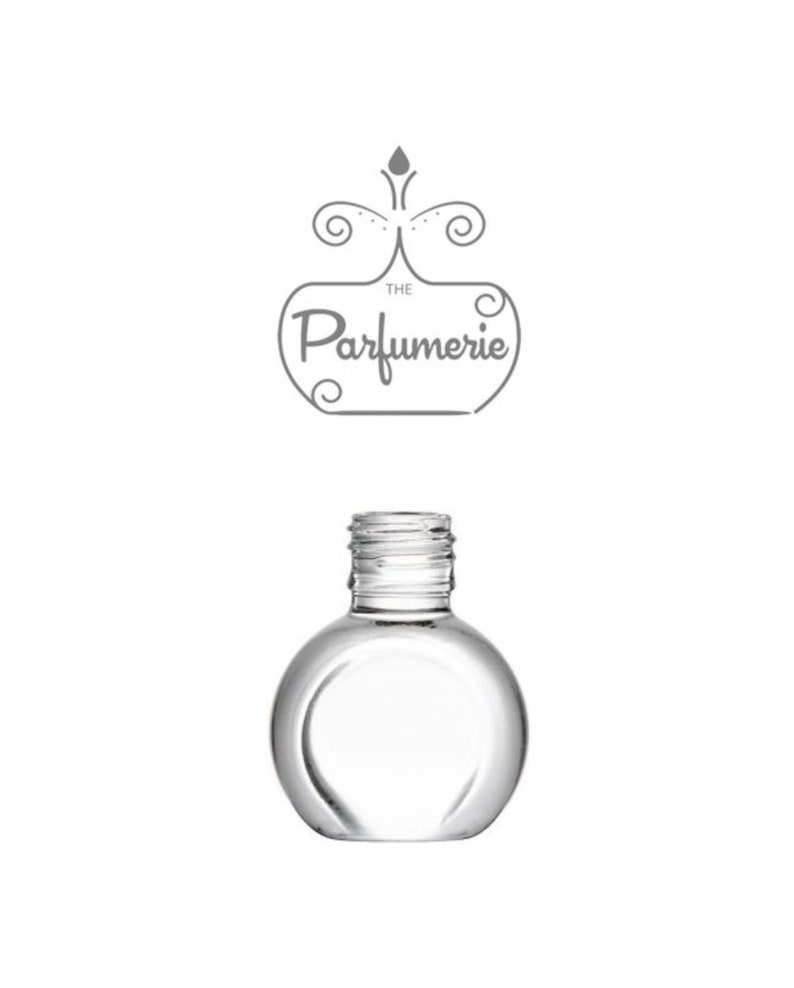 A clear glass travel perfume bottle.