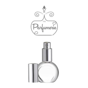 A clear, glass, rounded perfume bottle with a silver sprayer and flat front to accommodate a perfume label.