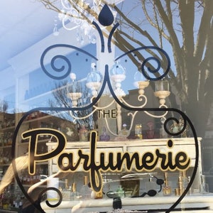 The Parfumerie Logo from the Store Front Window in Danbury, CT.