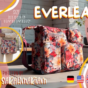 Könnte beinhalten: Schultertasche mit Blumenmuster und mehreren Taschen, mit einem Design, das rote, orangefarbene und weiße Blumen umfasst. Die Tasche misst 30 x 30 x 14 cm. Das Wort "EVERLEA" wird in großen, gelben Buchstaben angezeigt. Das Muster ist von SarahMariam.