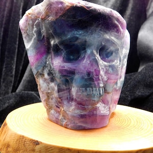 Fluorite Crystal Skull Sculpture  Hand Carved Blue Purple Skull  Crystal Healing Art on Wood Base