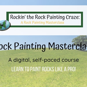 May include: A digital, self-paced rock painting masterclass. Learn to paint rocks like a pro! The image shows a painted rock with a butterfly design, a green field, and a tree.