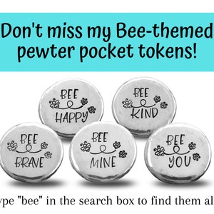 May include: Five silver-toned pewter pocket tokens with bee-themed designs. Each token features a bee and the words "Bee Happy", "Bee Kind", "Bee Brave", "Bee Mine", and "Bee You".