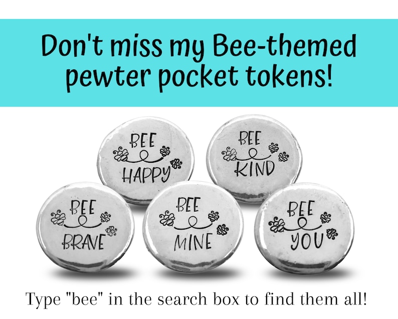May include: Five silver-toned pewter pocket tokens with bee-themed designs. Each token features a bee and the words "Bee Happy", "Bee Kind", "Bee Brave", "Bee Mine", and "Bee You".