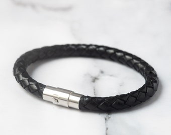 Bracelet homme en cuir tressé noir avec fermoir en acier inoxydable, bijoux masculins, accessoires et cadeaux originaux pour hommes.