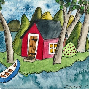 May include: A watercolor painting of a red cottage on a small island with green trees and a blue canoe in the water. The painting is signed "Janet Hill".