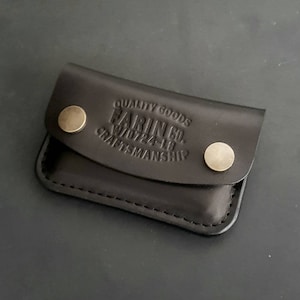 Leather card holder for 15 credit cards.