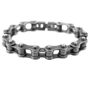 May include: A silver-toned chain bracelet made from linked metal pieces. The bracelet is made to look like a bicycle chain.