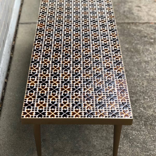 Mid century tiled coffee table in shades of brown, heart-shaped ceramic tiles - tapered bronze metal legs