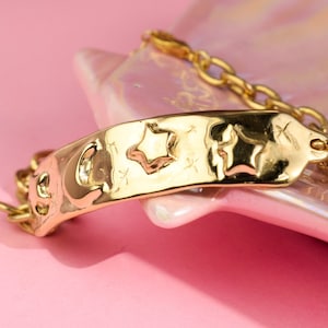 Moon and stars gold tag bracelet image 1