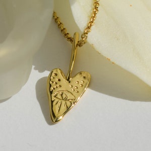 Heart and eye quirky necklace - gold heart necklace