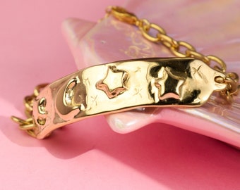 Moon and stars gold tag bracelet