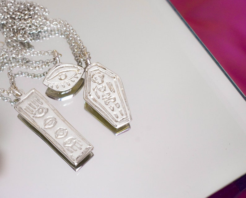 Skeleton in a coffin necklace